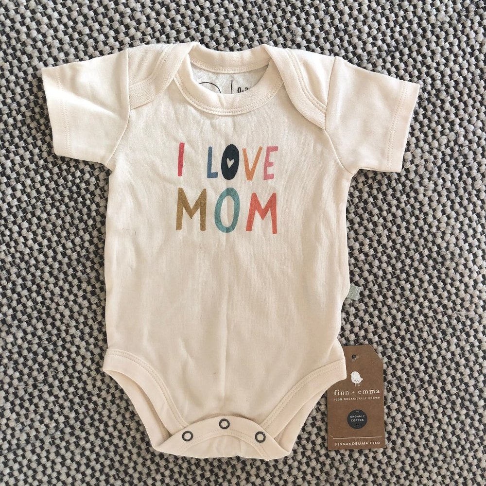 NWT finn + emma cream bodysuit 0-3 months